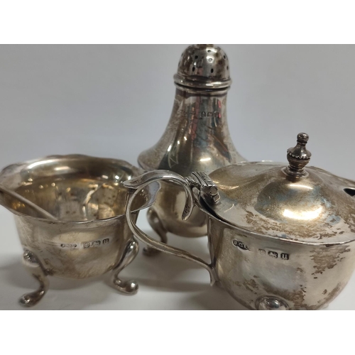 47 - Three hallmarked silver pieces, a mustard pot with blue glass liner, a salt and a pepperette (3)

88... 