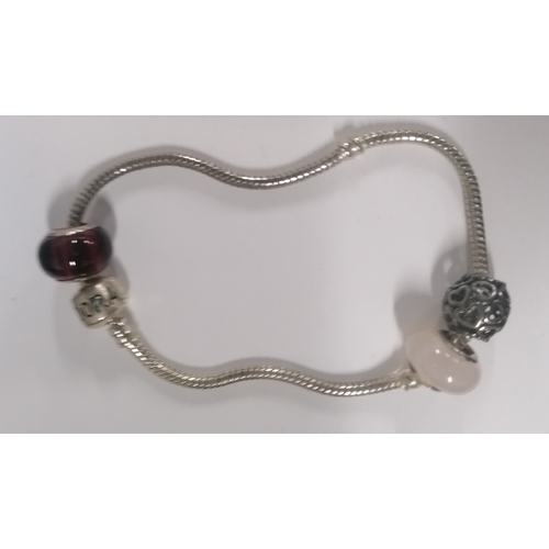 54 - Pandora bracelet with three bead charms