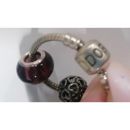 54 - Pandora bracelet with three bead charms