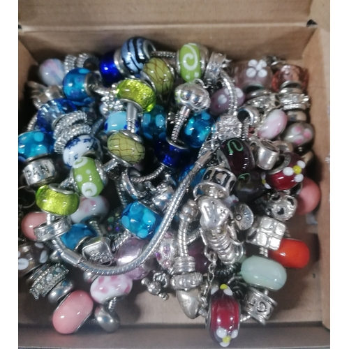 56 - Collection of pandora-style bracelets with charms and beads, some possibly silver (Qty)