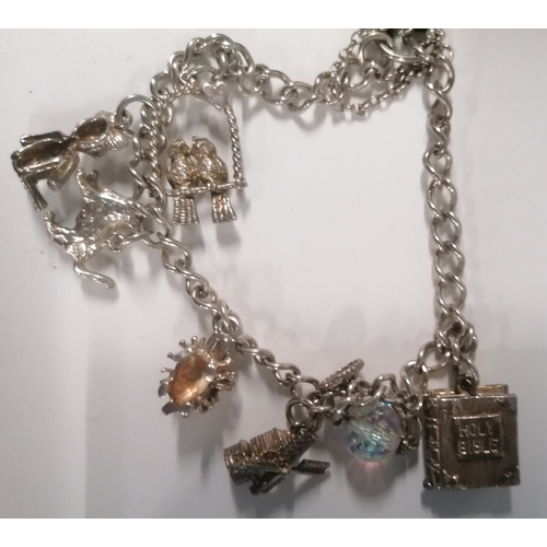 59 - 925 silver charm bracelet with seven charms and a 925 donkey pendant on chain (2)