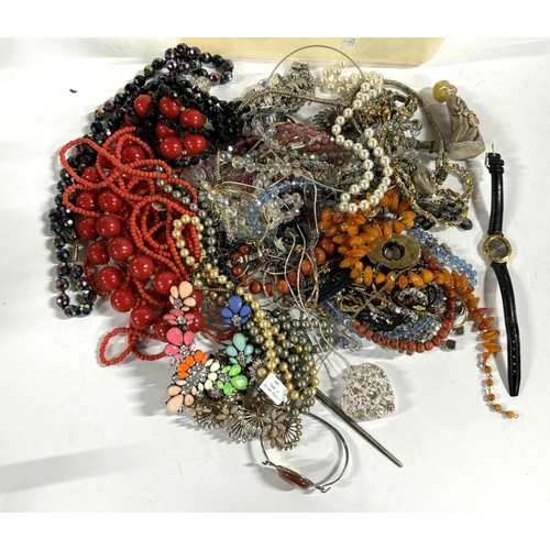 63 - Large quantity of costume jewellery, mainly beaded necklaces together with a ladies Rotary watch (Qt... 