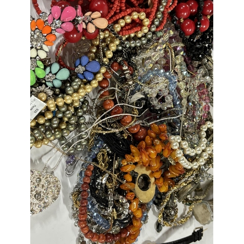 63 - Large quantity of costume jewellery, mainly beaded necklaces together with a ladies Rotary watch (Qt... 