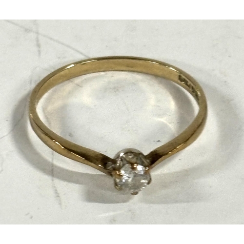 64 - 9ct yellow gold with white stone dress dress ring