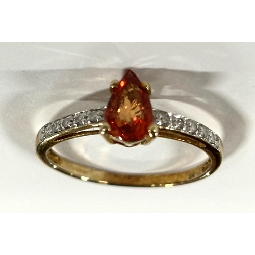 66 - 9ct yellow gold and oval cut orange citrine with diamond chips to the shoulder