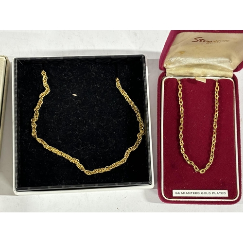 69 - Three gold coloured costume jewellery, all boxed (3)