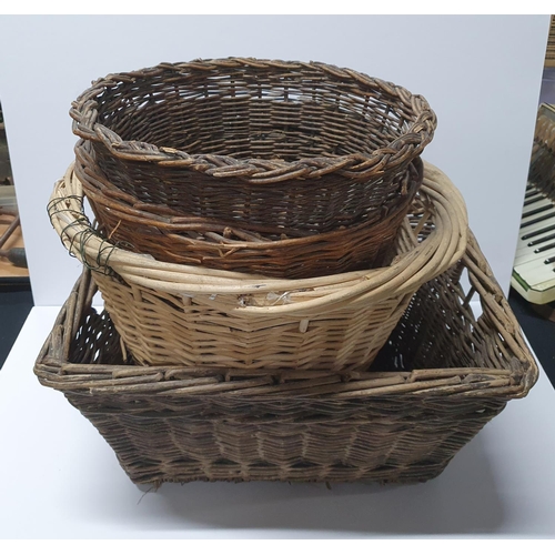 106 - Four old wicker storage baskets (4)