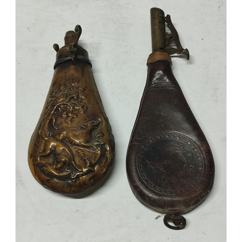 151 - Two powder flasks, one Brass the other Leather, both depicting wildlife (2)