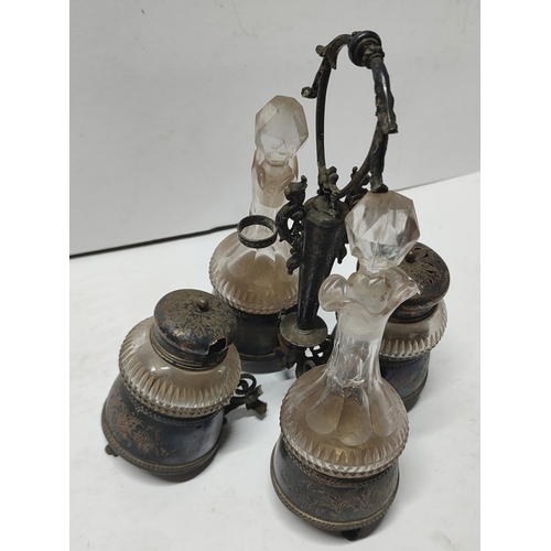 156 - Antique four-arm condiment set with markings to collars, a/f