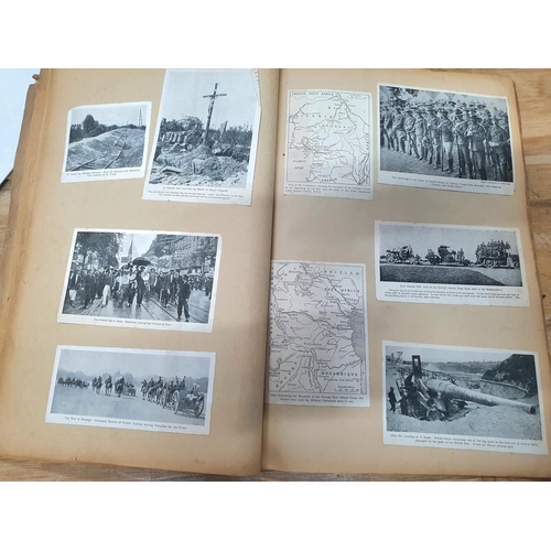 218 - WWI era scrap book containing magazine picture cut-out pictures depicting army and naval pictures (Q... 