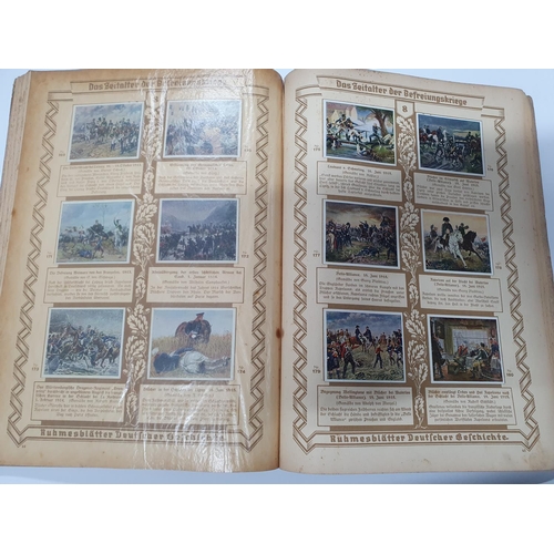 220 - German, mid 20thC, extensive cigarette or tea card album (60 pages) depicting  historic armies and b... 