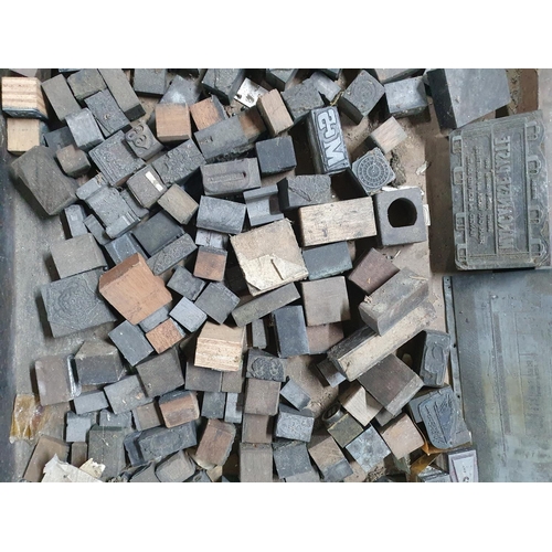 235 - Wooden printers tray containing a large quantity of small old printing blocks (Qty)