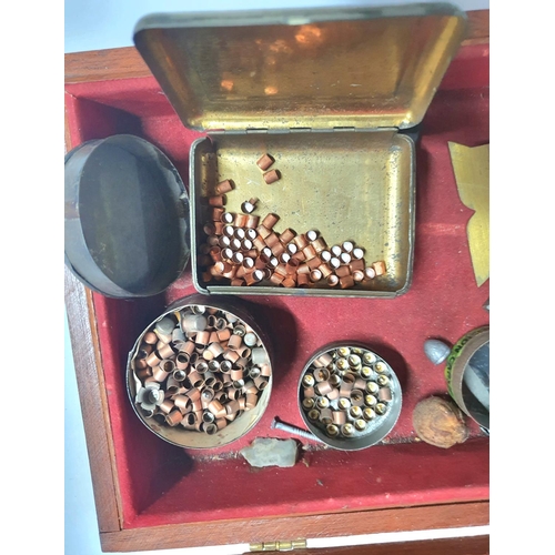 276 - Wooden box with red cloth inner containing small tubs of metal gun pellets, lead bullet heads and fl... 