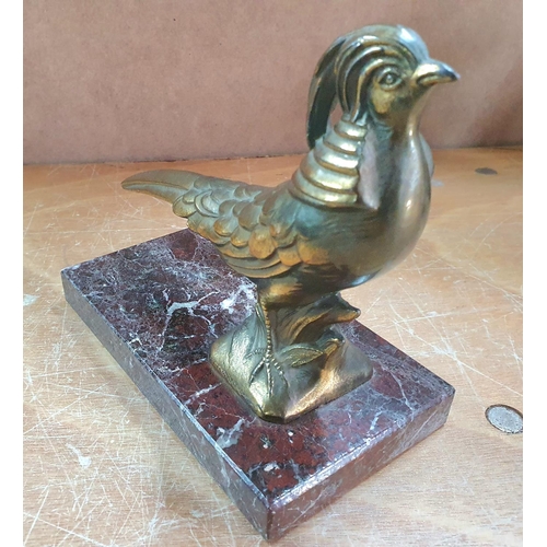 302 - Bronze bird of Paradise on a marble base,

16 cm long