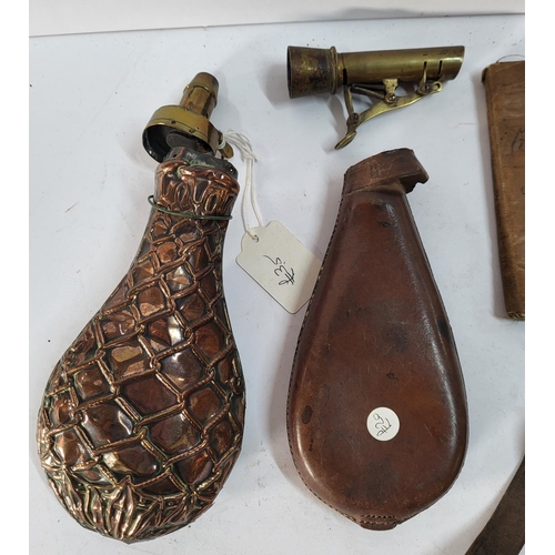 318 - Collection of various items including two gunpowder flasks (a/f) and a WW1 British soldiers translat... 