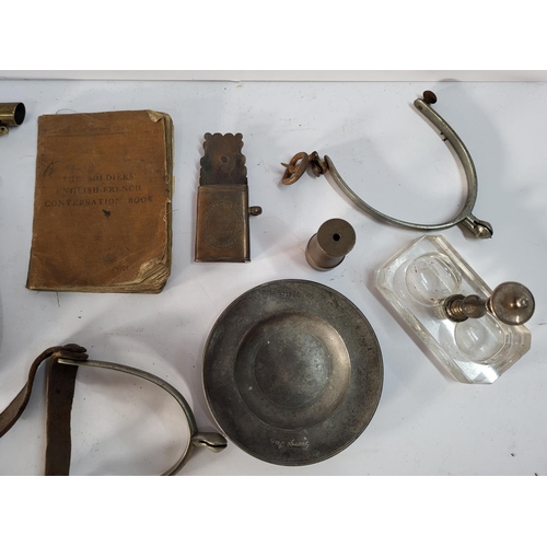 318 - Collection of various items including two gunpowder flasks (a/f) and a WW1 British soldiers translat... 