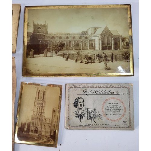 319 - Two framed photographs, Photograph album and a signed picture of 