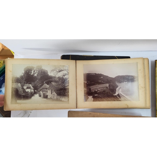 319 - Two framed photographs, Photograph album and a signed picture of 