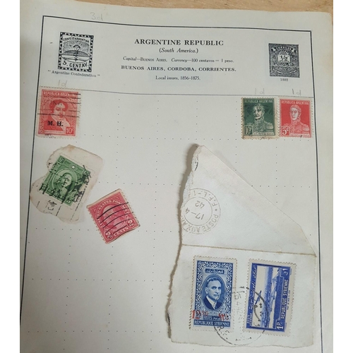 574 - Old red Strand stamp album with a quantity of 19th and 20thC world stamps (Qty)