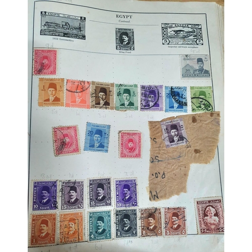 574 - Old red Strand stamp album with a quantity of 19th and 20thC world stamps (Qty)