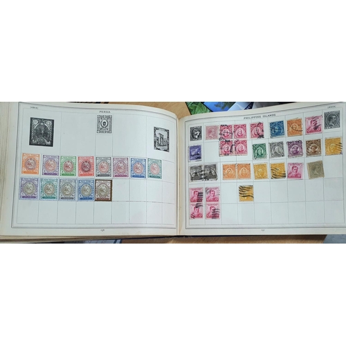 575 - Old blue Improved stamp album many 19thC and early 20thC stamps from GB, Commonwealth and the world ... 