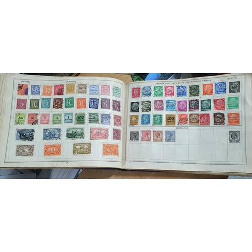 575 - Old blue Improved stamp album many 19thC and early 20thC stamps from GB, Commonwealth and the world ... 