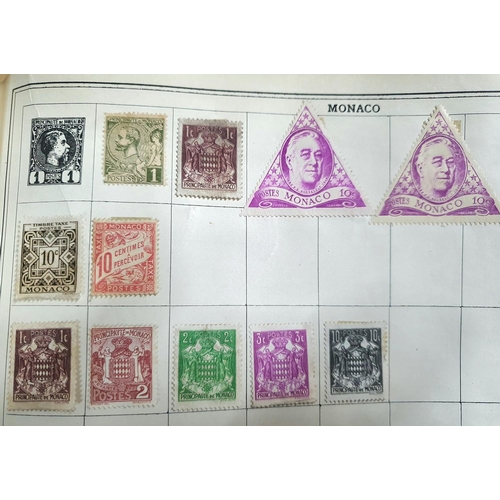 575 - Old blue Improved stamp album many 19thC and early 20thC stamps from GB, Commonwealth and the world ... 