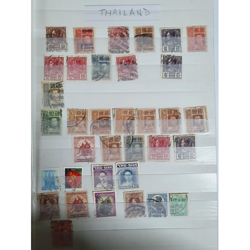 579 - Blue stamp album containing a large quantity of mainly European and Thai stamps, mainly used, 19th a... 