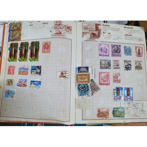 588 - Three various stamp albums containing various world stamps with one album virtually full of Austria,... 