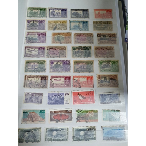 590 - Blue stock book containing a large quanity of India 19th and 20thC mainly used unmounted and some Ma... 