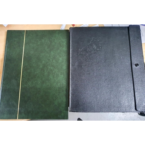 596 - Green and black album containing Ajman (UAE) used 20thC sets and sheets the black album containing a... 