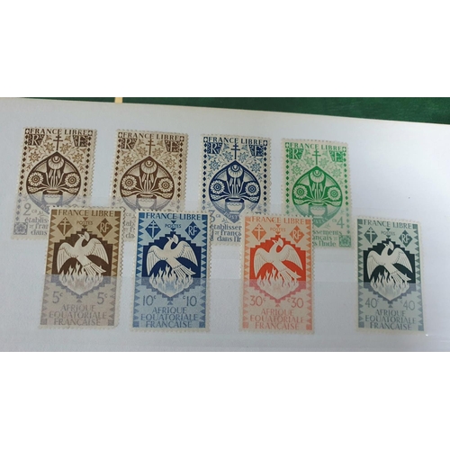 599 - Green and  red stock albums, the green containing a large quantity of Belgium stamps, both used and ... 