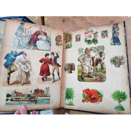 353 - Late Victorian blue scrap album containing a large quantity of colourful scraps (Qty)