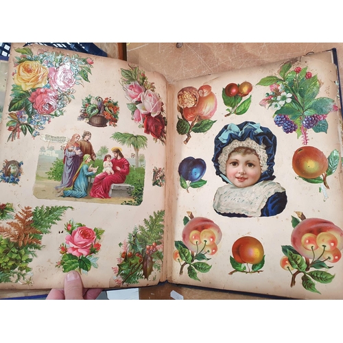 353 - Late Victorian blue scrap album containing a large quantity of colourful scraps (Qty)