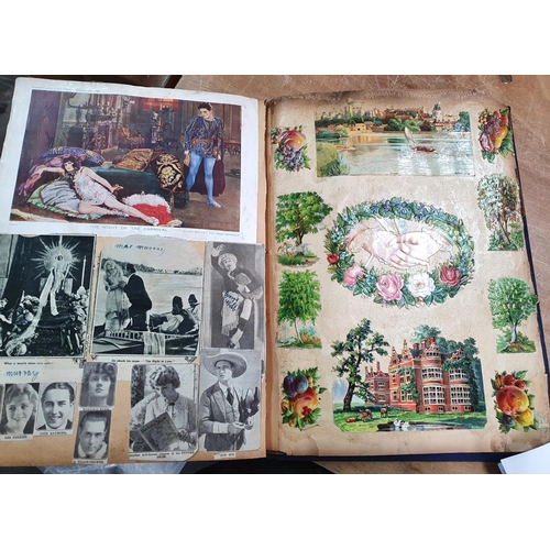 353 - Late Victorian blue scrap album containing a large quantity of colourful scraps (Qty)