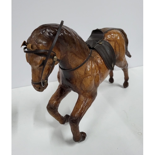 370 - Decorative, vintage leather horse with saddle