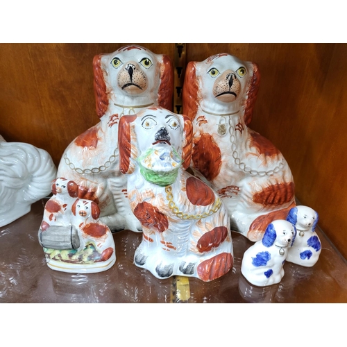 549 - Collection of Victorian Staffordshire dogs (7)