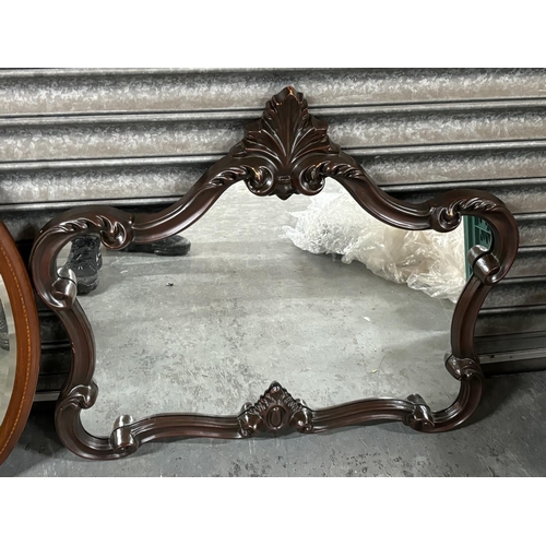 398 - Ornate over-mantle mirror together with an antique oval example (2)