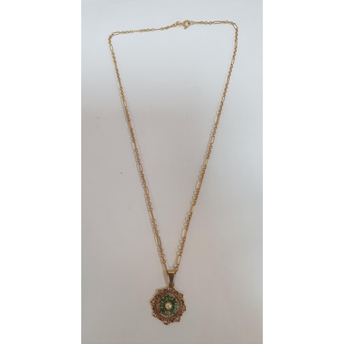 30 - Large 9ct yellow gold pendent with a central pearl surrounded by small Jade cabochons on a 9ct yello... 