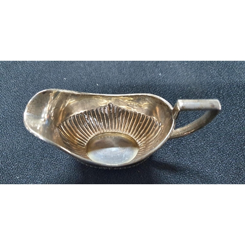 28 - Birmingham Edwardian silver cream jug in the classical Georgian style,

Approx 43 grams