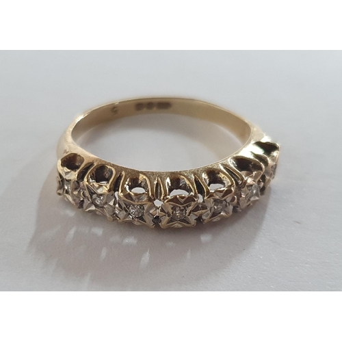 49 - Fully hallmarked 9ct yellow gold ring inset with 7 small round cut diamonds,

2.2 grams gross       ... 