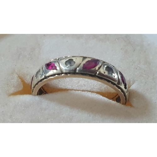 54 - Fully hall-marked 9ct white gold eternity ring with ruby and other semi-precious stones,

2.8 grams ... 