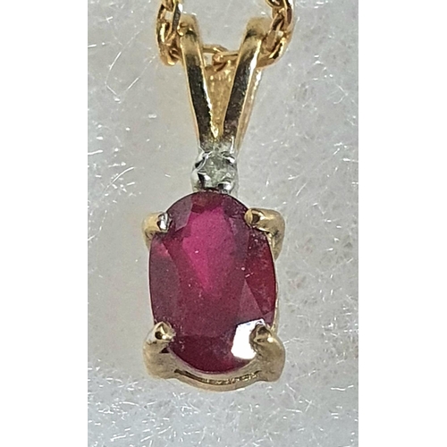 76 - 9ct yellow gold chain with large oval cut Ruby below a smaller diamond  pendent,

1.9 grams gross   ... 