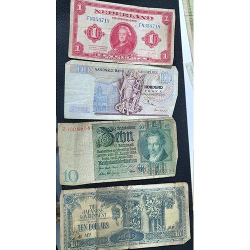 209 - Quantity of old British, European and world bank notes, mainly mid 20thC together with a vintage lea... 