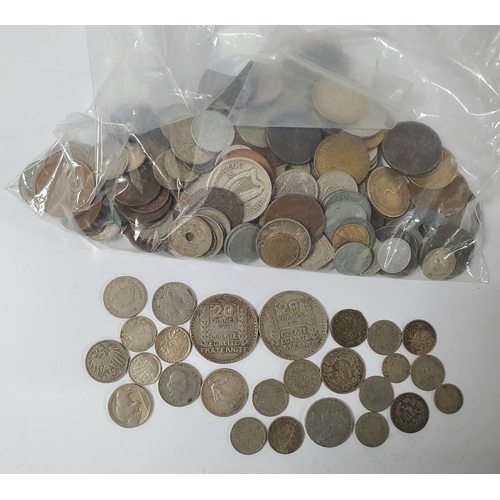 216 - Quantity of 19th & 20thC foreign coins, largely unsorted to include possibly a number of silver exam... 