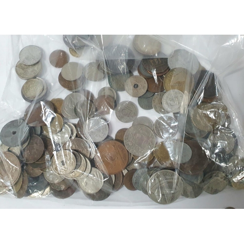 216 - Quantity of 19th & 20thC foreign coins, largely unsorted to include possibly a number of silver exam... 