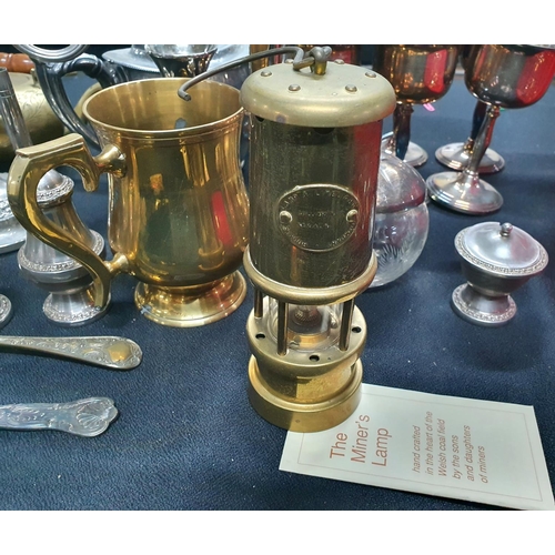 222 - Large quantity of good quality metalware including a miner lamp, six goblets, flatware etc (Qty)