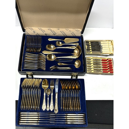 224 - Blue Solingham Germany gold plated cutlery set with 2 other small cutlery sets