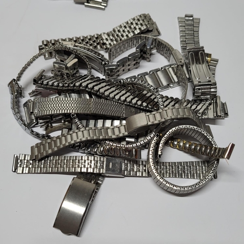 259 - Large quantity of good quality, new and unused, metal watch straps and casings (Qty),

Please note -... 