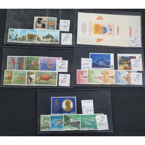 348 - Five small dealer cards containing Thailand etc (including high value sets), mint unmounted 20thC (5... 